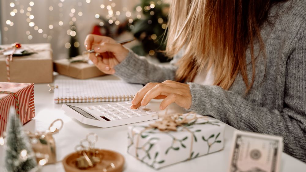 woman using calculator