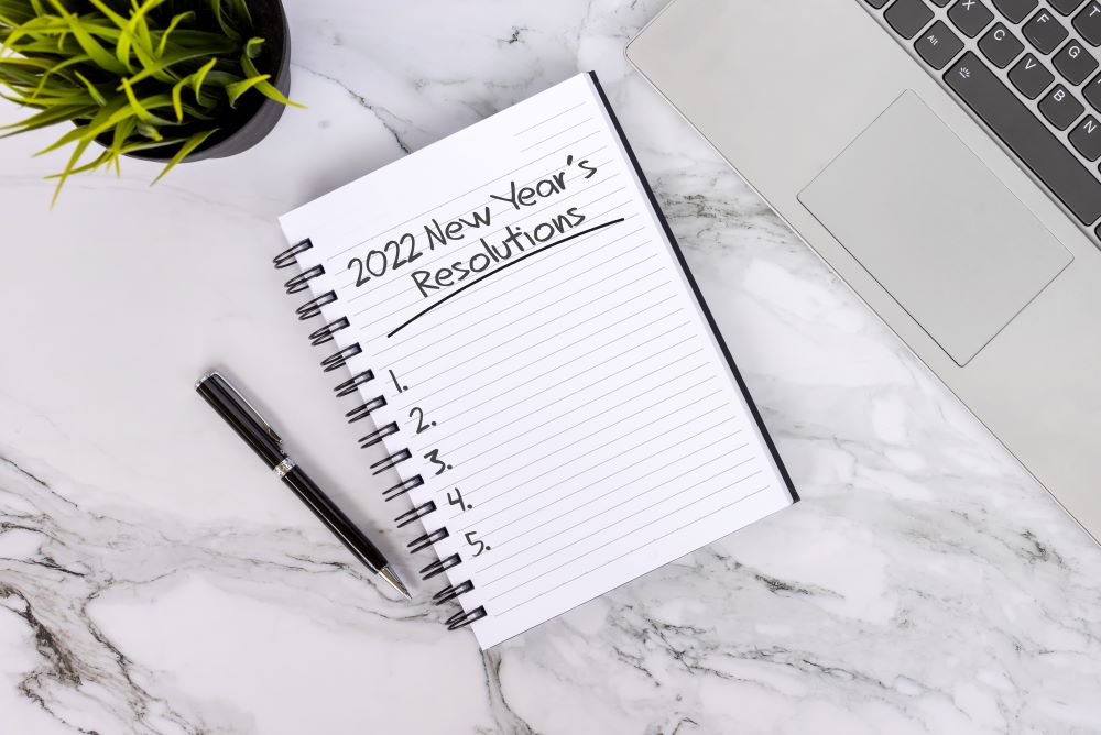 Notebook with a list of 2022 new year's resolutions