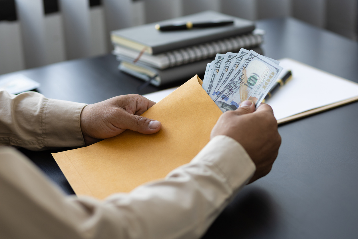 Business people in the office receiving wages from work.