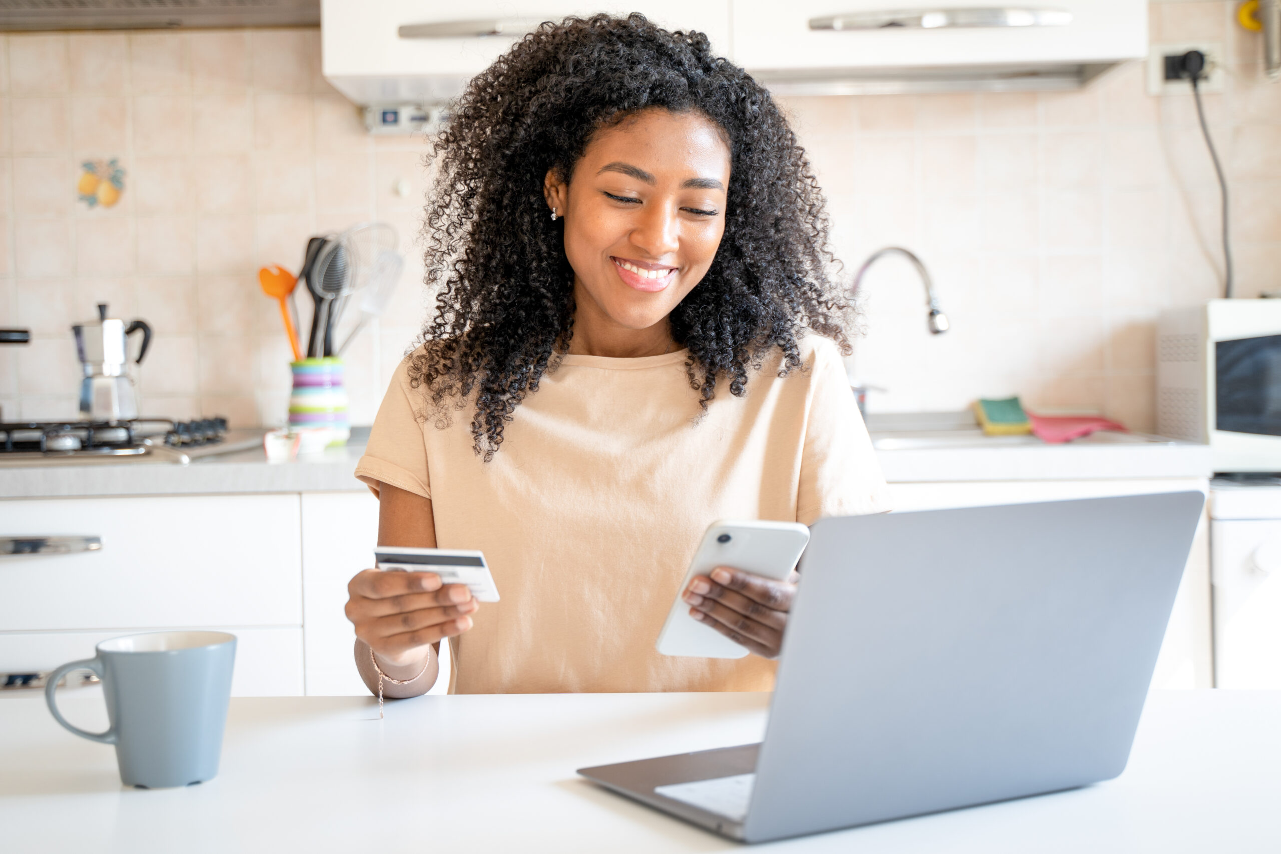 Woman paying online using credit card